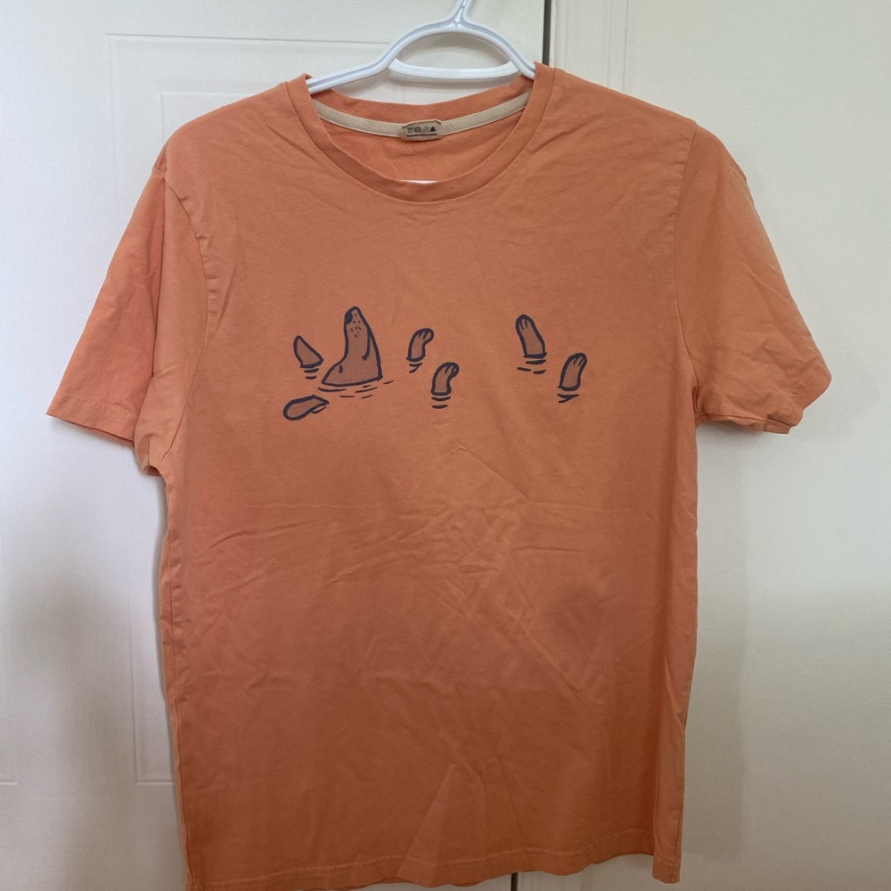 Orange Short Sleeve Tee with Nature-Inspired Design